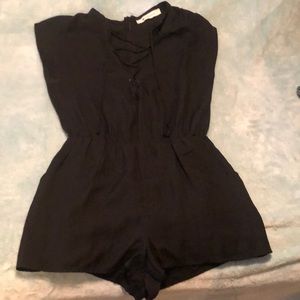The Impeccable Pig Black Lace-Up Romper